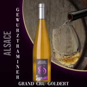 Bouteille du vin blanc Gewurztraminer Grand Cru Goldert du Domaine Schneider en Alsace. Robe dorée et étiquette indiquant l'appellation Grand Cru.