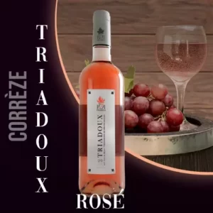 Bouteille du vin rosé Triadoux Rosé de 1001 Pierres, vignoble de Corrèze. Robe saumonée et étiquette avec le nom du vin.